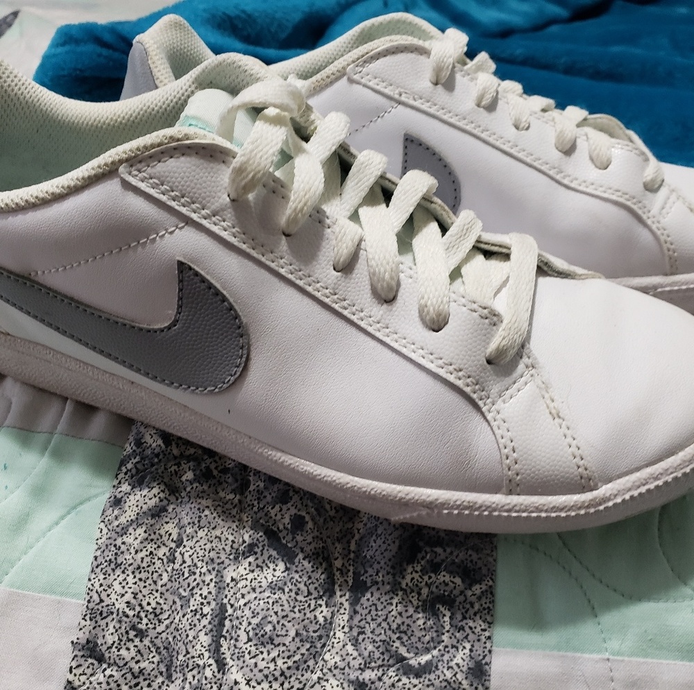 White and gray Nike shoes
